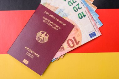 Alman vatandaşı pasaportu, Alman ulusal bayrağının arka planına karşı tasarımınız için bir arka plan.