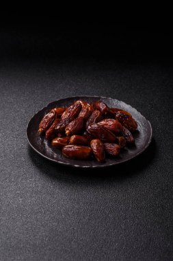 Kurutulmuş tropikal tarih meyvesi taze organik diyet gıdaları için bir malzeme olarak kullanılır. Vegan, vejetaryen yemeği