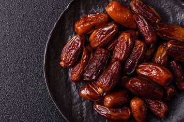 Kurutulmuş tropikal tarih meyvesi taze organik diyet gıdaları için bir malzeme olarak kullanılır. Vegan, vejetaryen yemeği