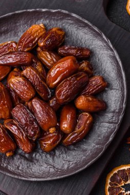 Kurutulmuş tropikal tarih meyvesi taze organik diyet gıdaları için bir malzeme olarak kullanılır. Vegan, vejetaryen yemeği