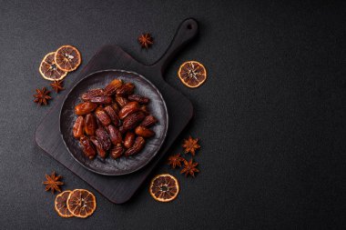 Kurutulmuş tropikal tarih meyvesi taze organik diyet gıdaları için bir malzeme olarak kullanılır. Vegan, vejetaryen yemeği