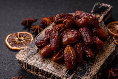 Kurutulmuş tropikal tarih meyvesi taze organik diyet gıdaları için bir malzeme olarak kullanılır. Vegan, vejetaryen yemeği