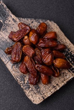 Kurutulmuş tropikal tarih meyvesi taze organik diyet gıdaları için bir malzeme olarak kullanılır. Vegan, vejetaryen yemeği