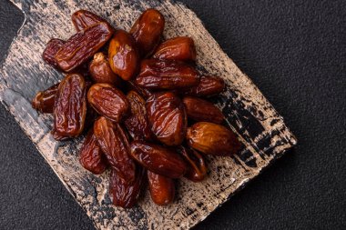 Kurutulmuş tropikal tarih meyvesi taze organik diyet gıdaları için bir malzeme olarak kullanılır. Vegan, vejetaryen yemeği