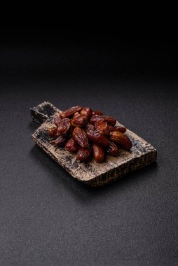 Kurutulmuş tropikal tarih meyvesi taze organik diyet gıdaları için bir malzeme olarak kullanılır. Vegan, vejetaryen yemeği