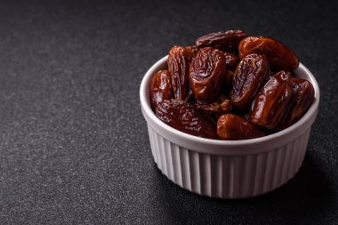 Kurutulmuş tropikal tarih meyvesi taze organik diyet gıdaları için bir malzeme olarak kullanılır. Vegan, vejetaryen yemeği