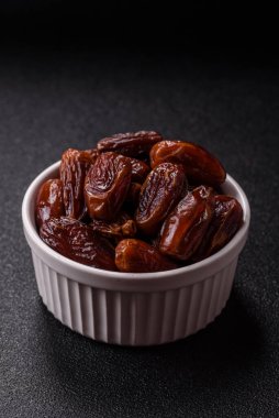 Kurutulmuş tropikal tarih meyvesi taze organik diyet gıdaları için bir malzeme olarak kullanılır. Vegan, vejetaryen yemeği