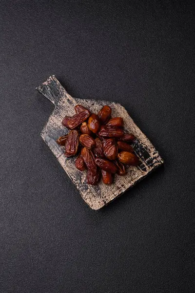 Kurutulmuş tropikal tarih meyvesi taze organik diyet gıdaları için bir malzeme olarak kullanılır. Vegan, vejetaryen yemeği