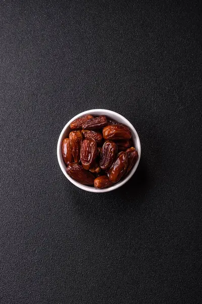 Kurutulmuş tropikal tarih meyvesi taze organik diyet gıdaları için bir malzeme olarak kullanılır. Vegan, vejetaryen yemeği