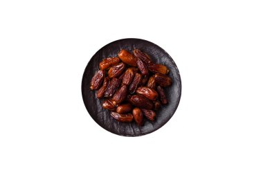 Kurutulmuş tropikal tarih meyvesi taze organik diyet gıdaları için bir malzeme olarak kullanılır. Vegan, vejetaryen yemeği