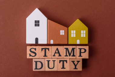 Pul vergisi, emlak yatırım konsepti, gayrimenkul ile ilgili iş süreçleri. İş tasarımı için arka plan olarak pul görevi yazıtları