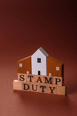 Pul vergisi, emlak yatırım konsepti, gayrimenkul ile ilgili iş süreçleri. İş tasarımı için arka plan olarak pul görevi yazıtları