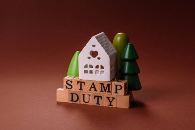 Pul vergisi, emlak yatırım konsepti, gayrimenkul ile ilgili iş süreçleri. İş tasarımı için arka plan olarak pul görevi yazıtları