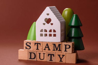 Pul vergisi, emlak yatırım konsepti, gayrimenkul ile ilgili iş süreçleri. İş tasarımı için arka plan olarak pul görevi yazıtları