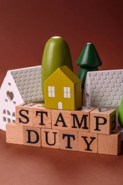 Pul vergisi, emlak yatırım konsepti, gayrimenkul ile ilgili iş süreçleri. İş tasarımı için arka plan olarak pul görevi yazıtları