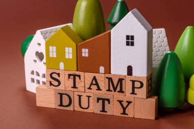 Pul vergisi, emlak yatırım konsepti, gayrimenkul ile ilgili iş süreçleri. İş tasarımı için arka plan olarak pul görevi yazıtları