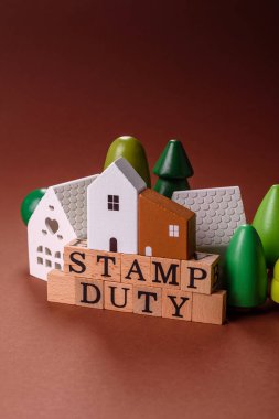 Pul vergisi, emlak yatırım konsepti, gayrimenkul ile ilgili iş süreçleri. İş tasarımı için arka plan olarak pul görevi yazıtları