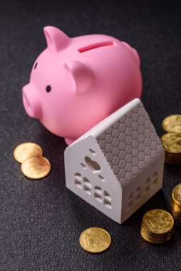 Piggy Bank madeni bir kavramsal arka plan olarak madeni paralar, iş yapmak, para biriktirmek, vergi ödemek ve borçları ödemek