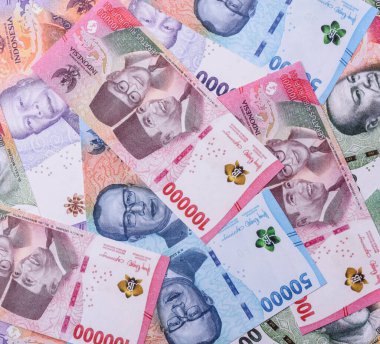 Rupiah parası, Endonezya banknotları mal alıp satmak ve diğer para birimleriyle takas etmek için. Endonezya parası şeklinde bir geçmiş