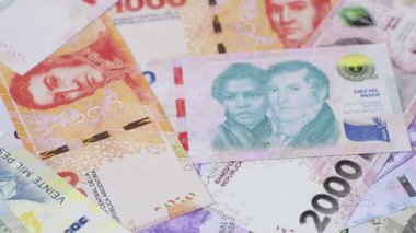 Arjantin Pezo kağıt parasının geçmişi, farklı değerlerde notlar. İş yapmak, kavramsal geçmiş