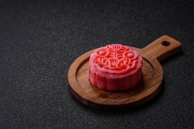 Çin ay çöreği, pirinç hamuru ve meyve dolgulu Asya tatlı tatlısıdır. Tasarımınız için arka plan olarak Asya ay pastası