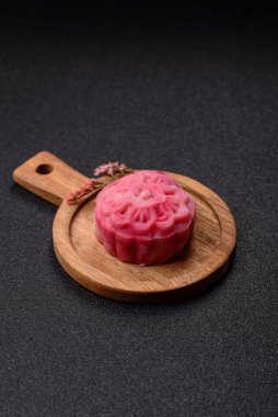 Çin ay çöreği, pirinç hamuru ve meyve dolgulu Asya tatlı tatlısıdır. Tasarımınız için arka plan olarak Asya ay pastası