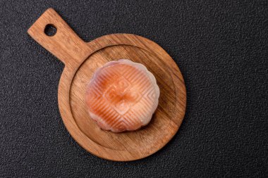 Çin ay çöreği, pirinç hamuru ve meyve dolgulu Asya tatlı tatlısıdır. Tasarımınız için arka plan olarak Asya ay pastası