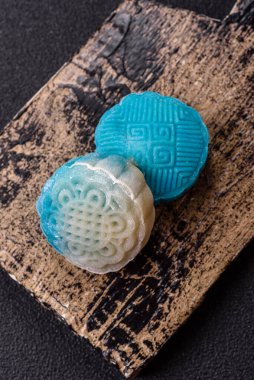 Çin ay çöreği, pirinç hamuru ve meyve dolgulu Asya tatlı tatlısıdır. Tasarımınız için arka plan olarak Asya ay pastası