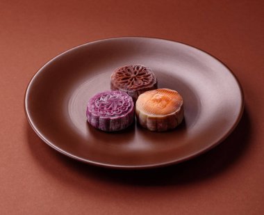 Çin ay çöreği, pirinç hamuru ve meyve dolgulu Asya tatlı tatlısıdır. Tasarımınız için arka plan olarak Asya ay pastası