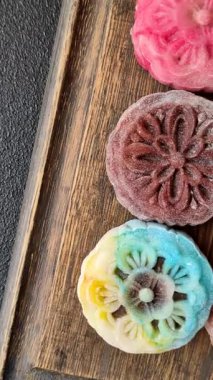 Çin ay çöreği, pirinç hamuru ve meyve dolgulu Asya tatlı tatlısıdır. Tasarımınız için arka plan olarak Asya ay pastası