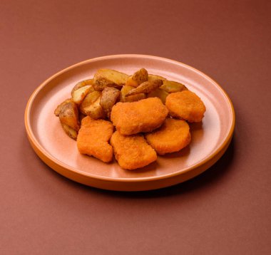 Çıtır tavuk nugget, tuzlu ve baharatlı et yemeği. Tavuk nugget, fast food, abur cubur.