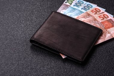 Brezilya 'nın nakit kağıt parası, yatırım, tasarruf ve kârlı yatırımların kavramsal bir geçmişi olarak farklı mezheplerin notları. Tasarımınız için Brezilya nakit gerçekleriName