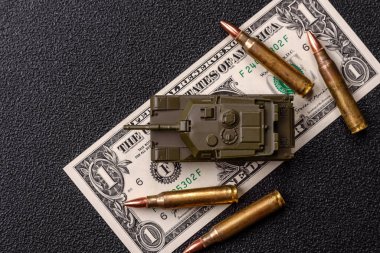 Para, savaş için para ve saldırıya karşı savunma için para. Kavramsal bir zemin olarak savaş için dolar