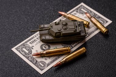 Para, savaş için para ve saldırıya karşı savunma için para. Kavramsal bir zemin olarak savaş için dolar