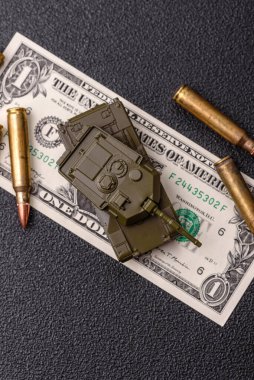 Para, savaş için para ve saldırıya karşı savunma için para. Kavramsal bir zemin olarak savaş için dolar