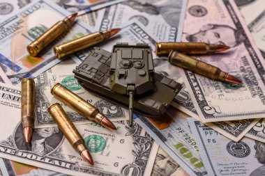 Para, savaş için para ve saldırıya karşı savunma için para. Kavramsal bir zemin olarak savaş için dolar