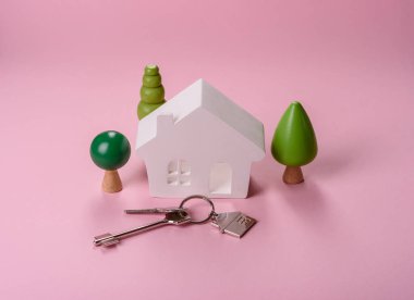 Ev, emlak almak ya da satmak, para ve kumbarayla konsept geçmişi. Emlak, emlak ve kira için arka plan