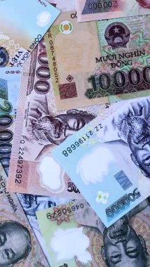 Vietnam parası, penis, kağıt banknotlar, nakit. Vietnam parası iş yapmak, seyahat etmek için.