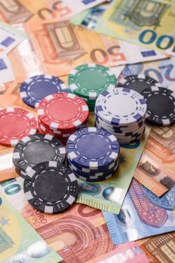 Kumarhane fişleri, bahisler, kumar, kazanma ya da kaybetme riski. Tasarımınız için arka plan olarak bahis çipleri