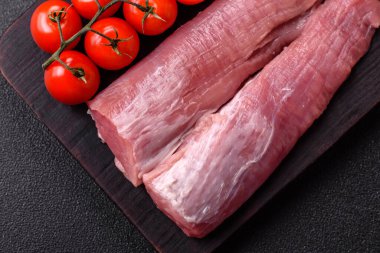 Çiğ domuz filetosu, taze et, protein kaynağı ve sağlıklı bir yemek için malzeme. Domuz filetosu tasarımın için bir yemek arkaplanı..