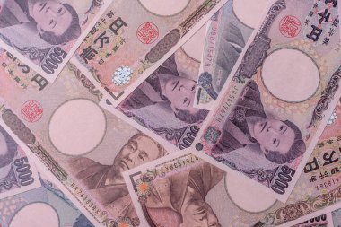 Japonya, Japon yeni kağıt banknotlar, iş için para, finansal işlemler ve anlaşmalar. Tasarımınız için finansal bir arkaplan olarak Japonca yen.