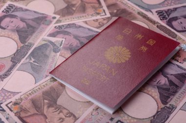 Japanese passport or id document with tickets for flight, travel, border crossing. Japan passport and tickets as a background for your design