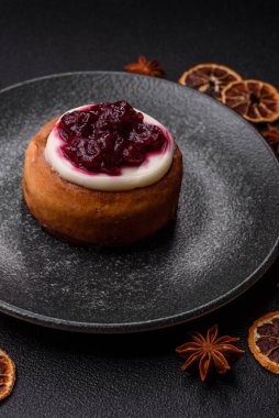 Cinnamon roll, a sweet bun with citrus, cherries, and chocolate, a Danish dessert with cream. Cinnamon roll as a food background for your design