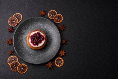 Cinnamon roll, a sweet bun with citrus, cherries, and chocolate, a Danish dessert with cream. Cinnamon roll as a food background for your design