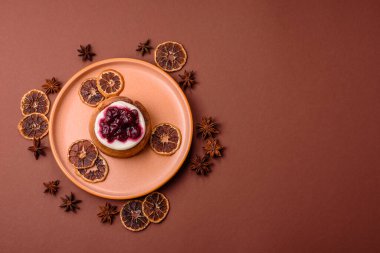 Cinnamon roll, a sweet bun with citrus, cherries, and chocolate, a Danish dessert with cream. Cinnamon roll as a food background for your design