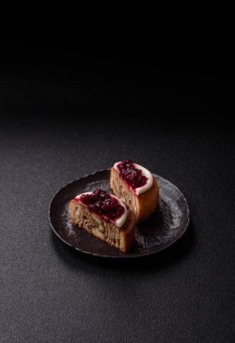 Cinnamon roll, a sweet bun with citrus, cherries, and chocolate, a Danish dessert with cream. Cinnamon roll as a food background for your design