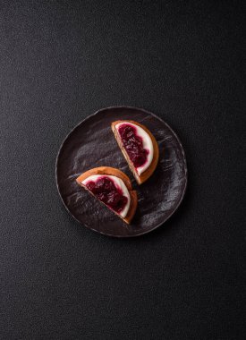 Cinnamon roll, a sweet bun with citrus, cherries, and chocolate, a Danish dessert with cream. Cinnamon roll as a food background for your design