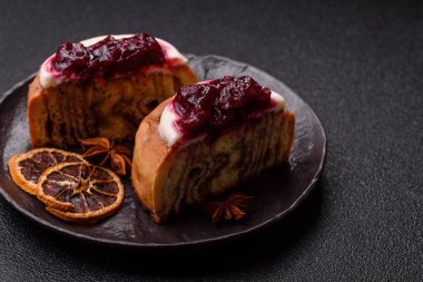 Cinnamon roll, a sweet bun with citrus, cherries, and chocolate, a Danish dessert with cream. Cinnamon roll as a food background for your design