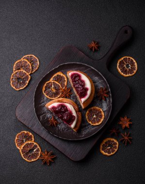 Cinnamon roll, a sweet bun with citrus, cherries, and chocolate, a Danish dessert with cream. Cinnamon roll as a food background for your design