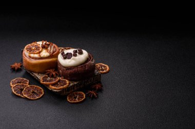 Cinnamon roll, a sweet bun with citrus, cherries, and chocolate, a Danish dessert with cream. Cinnamon roll as a food background for your design